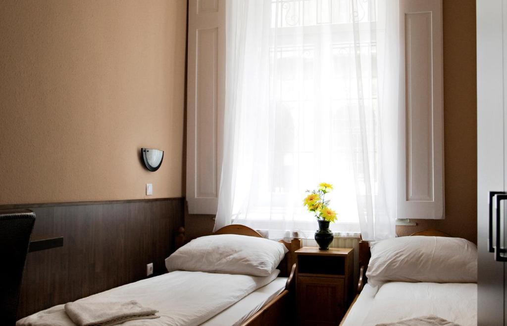 Corvin Point Rooms And Apartments Budapeste Quarto foto